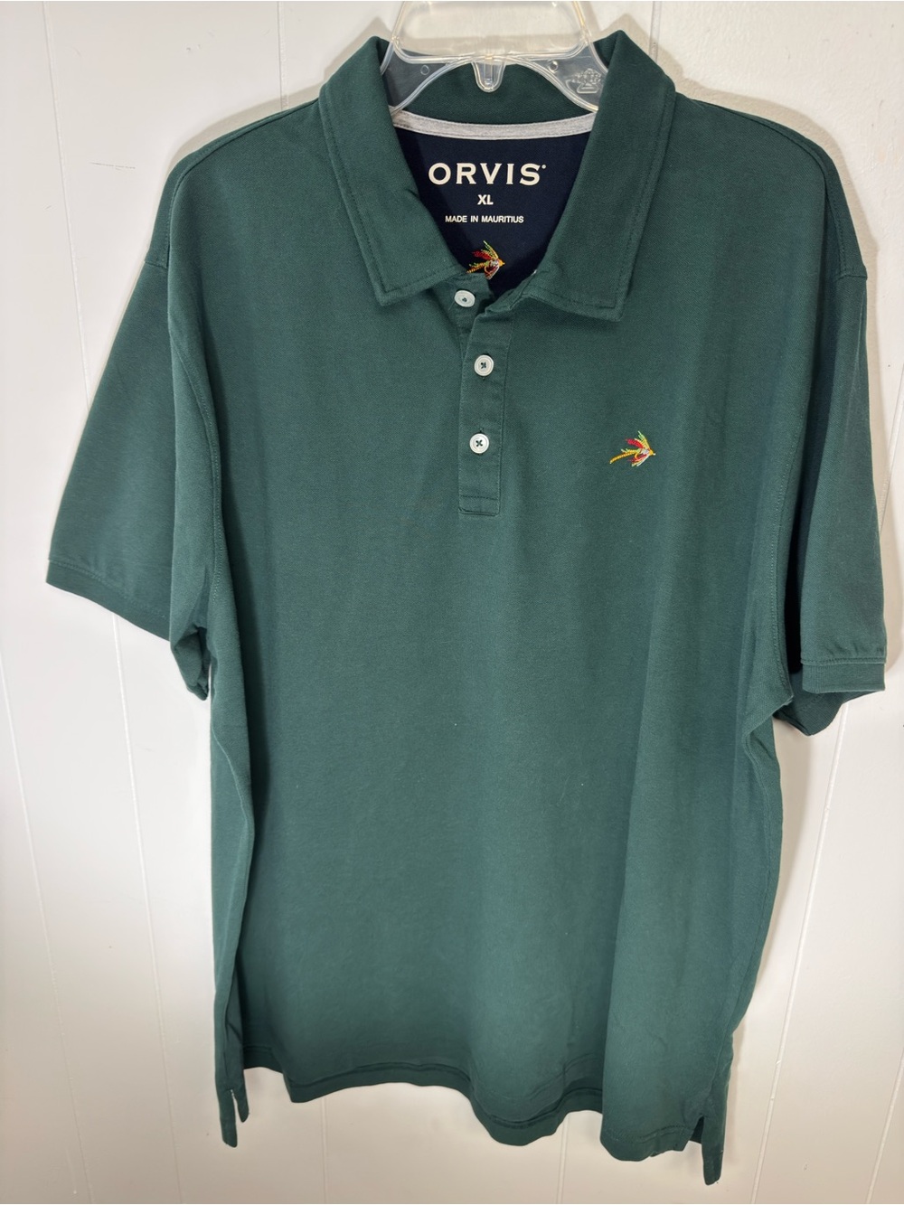 Orvis Men's Polo in Forest Green with Multicolor Fly Lure Emblem